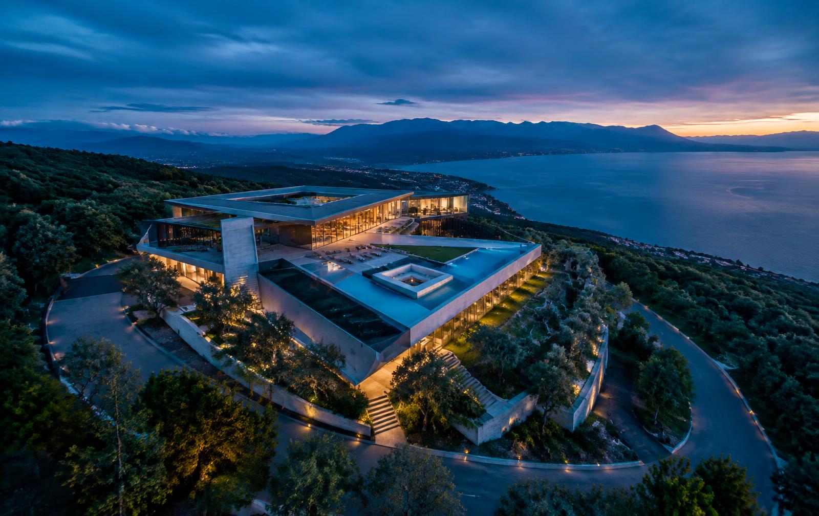Aerial view of contemporary architecture by a lake